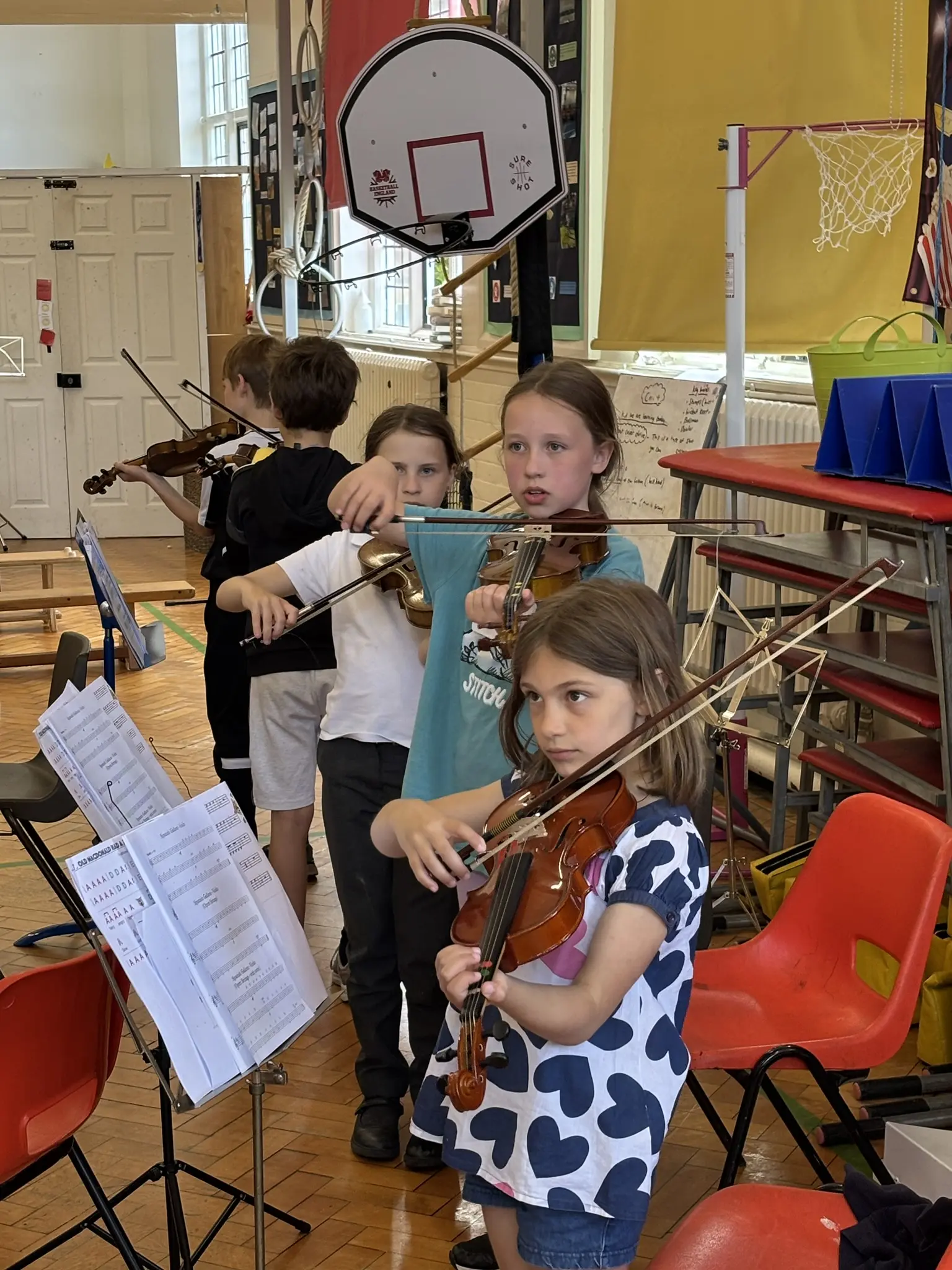 Young string players receiving music tuition in York